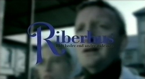 Figure 4: Still of dairyman and woman with logo from TV commercial for Riberhus